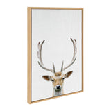 Framed canvas print of a deer with large antlers against a plain white background, featuring a light wood frame and minimalist design.