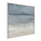 Abstract seascape painting in muted blues and grays with soft white brushstrokes, presented in a thin white frame viewed at an angle.
