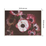Framed canvas featuring a bouquet of deep pink and white anemones with dark centers, set against a soft-focused, muted brown background, dimensions 33 by 23 inches.