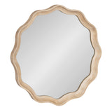 Round mirror with a scalloped wooden frame in light natural wood tones, featuring smooth curves and a clean reflective surface.