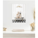Painting of a mother and baby polar bear cuddling inside a gray clawfoot bathtub on a black-and-white checkered floor beneath a modern gold chandelier and white paneled walls.