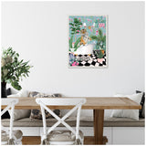 Framed canvas artwork featuring a tiger sitting in a white clawfoot bathtub surrounded by lush green plants and a black-and-white checkered floor, with pastel floral wallpaper background.