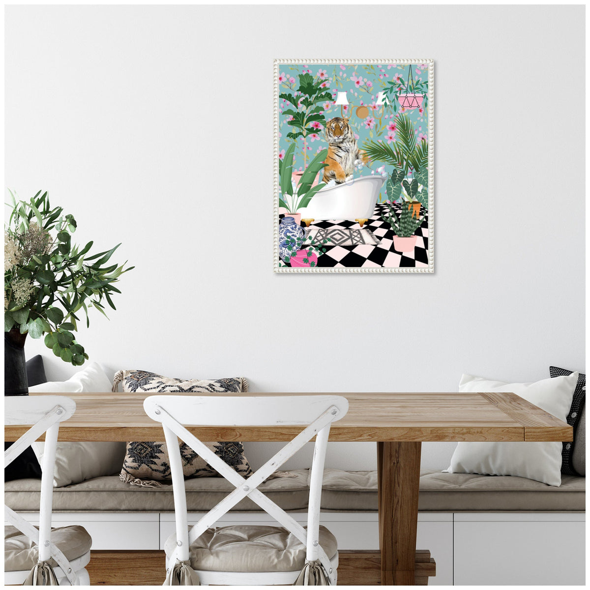 Framed canvas artwork featuring a tiger sitting in a white clawfoot bathtub surrounded by lush green plants and a black-and-white checkered floor, with pastel floral wallpaper background.