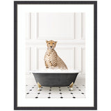 Framed black and white wall art print depicting a cheetah sitting in a classic bathtub by Amy Peterson