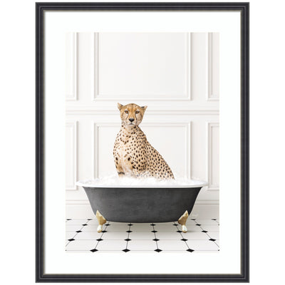 Framed black and white wall art print depicting a cheetah sitting in a classic bathtub by Amy Peterson