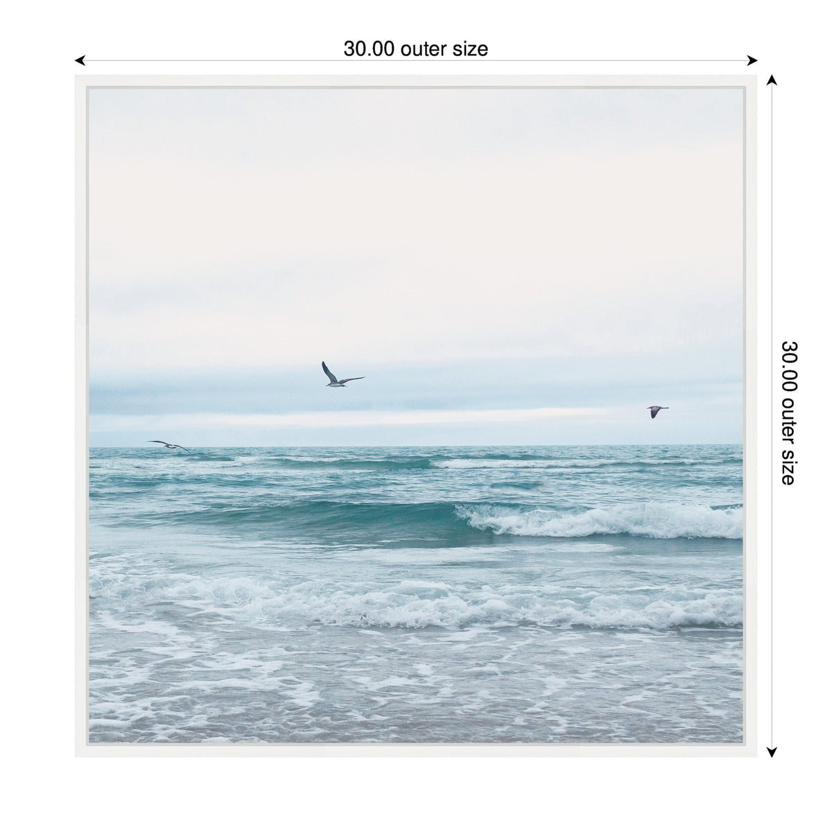 Calm ocean waves under a cloudy sky with three seagulls flying above the water, in a square white frame with 30-inch outer dimensions.
