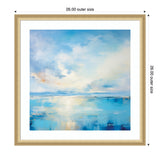 Abstract landscape painting depicting serene coastal waters with soft blue, white, and hints of warm orange tones under a cloudy sky, framed in a light wood square frame.