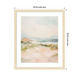 Softly blurred coastal landscape painting with sandy foreground, muted green foliage, pale blue sky, and distant brown and blue hills framed in light wood.
