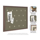 Square pinboard with green canvas featuring a repetitive light botanical print and dark wooden frame, shown with two black-and-white photos pinned.