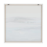 Framed abstract print featuring soft, horizontal blue and gray waves with subtle bubble-like textures, evoking a tranquil glacier scene.
