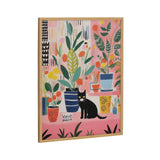 Colorful painting of assorted houseplants in vibrant pots with a black cat sitting among them on a pink background with patterned vertical stripes.
