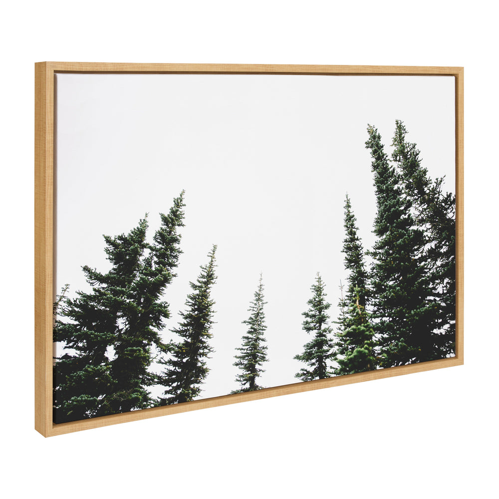 Sylvie Evergreens framed canvas art featuring green evergreen trees with a natural wood grain polystyrene frame