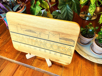 Handmade white oak charcuterie board with engraved Chattanooga skyline