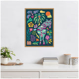 Colorful striped zebra surrounded by vibrant flowers and tropical plants against a dark green background, framed in light wood and hung on a white wall.