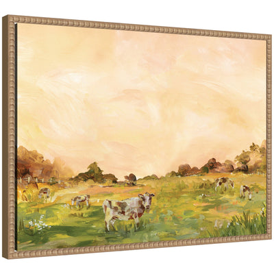 AQ Cows by Annie Quigley framed canvas wall art showing cows grazing in a sunlit field with sunset hues