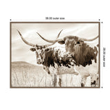 Two Texas Longhorn cattle with large curved horns standing in a grassy pasture under a cloudy sky in sepia tones, framed with outer size markings.