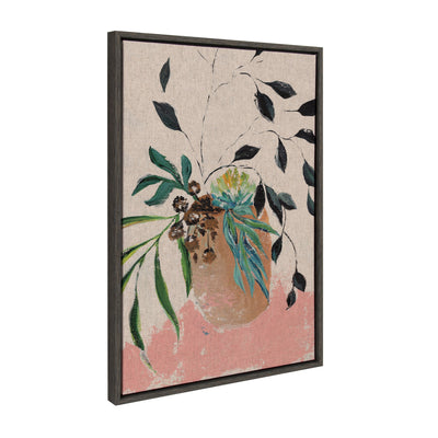 Framed canvas art titled Sylvie Wild Foliage in neutral linen by Nikita Jariwala, featuring green leaf artwork with modern floating frame