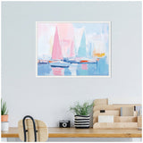 Abstract pastel painting of a harbor with sailboats featuring pink and light blue sails and soft reflections, framed in white and hung above a wooden desk.
