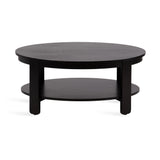Round black wood coffee table with four legs and a lower circular shelf, shown against a white background.