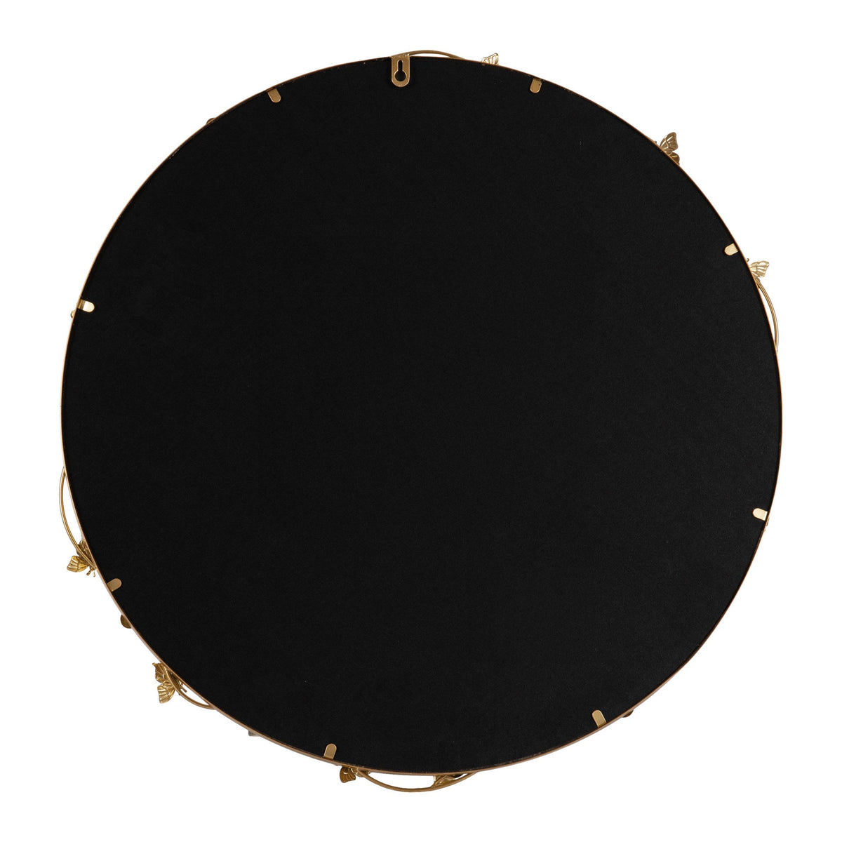 Round black-backed wall mirror with a decorative metal floral frame partially visible around the edges in gold tone