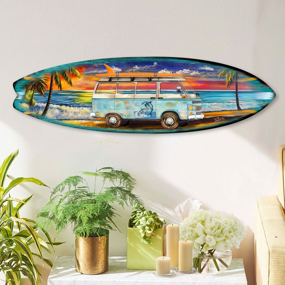 Oval wooden surfboard wall art depicting a blue vintage van with surfboards on top, set against a vibrant tropical beach sunset with palm trees and waves.