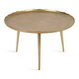 Round gold-toned coffee table with a slightly scalloped edge and three slender, tapered legs on a white background.