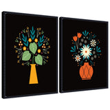 Two framed canvas art pieces each showing a stylized floral arrangement in a vase on black background; left has yellow vase with green leaves and small orange flowers, right has red vase with teal and cream flowers.