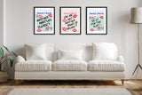 Three framed guest check artworks above a cream sofa, each with handwritten text, colorful lipstick kiss marks, and small heart doodles, arranged on a white wall.