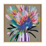 Abstract floral painting featuring bright pink, purple, yellow, and teal flowers in a striped white and purple vase on a muted taupe background, framed in light wood.