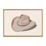 Minimalist illustration of a beige cowgirl hat casting a shadow on a cream background, framed in a simple light wood frame.