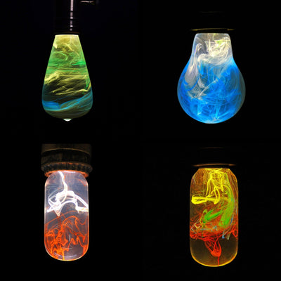EP Light 4-Pack Resin LED Bulb Bundle showing four handcrafted resin LED bulbs and wooden base