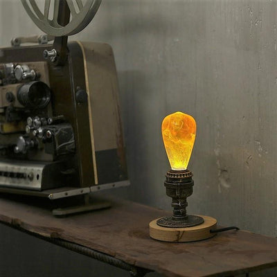 EP Light 4-Pack Resin LED Bulb Bundle showing Fire, Nebula, Youth, and Sunrise bulbs with wood base