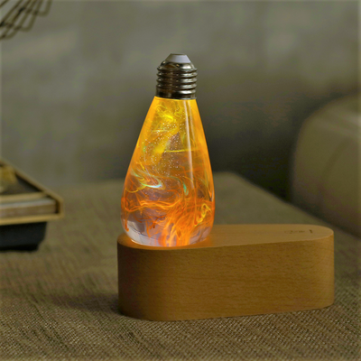 EP Light 4-Pack Resin LED Bulb Bundle showing Fire, Nebula, Youth, and Sunrise bulbs with wood base