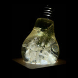 Three handcrafted flower-shaped resin LED bulbs in a 3-pack