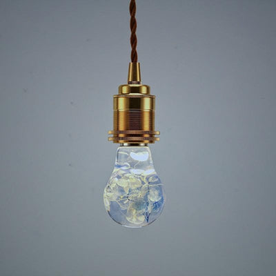 Three handcrafted flower-shaped resin LED bulbs in a 3-pack