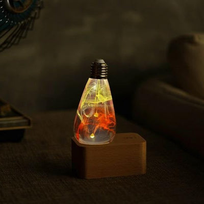EP Light Solar Corona Resin LED Bulb with wooden base showing unique resin design