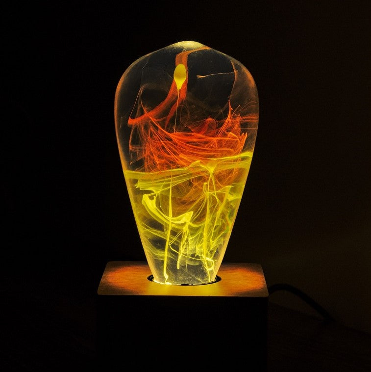 EP Light Solar Corona Resin LED Bulb with wooden base showing unique resin design