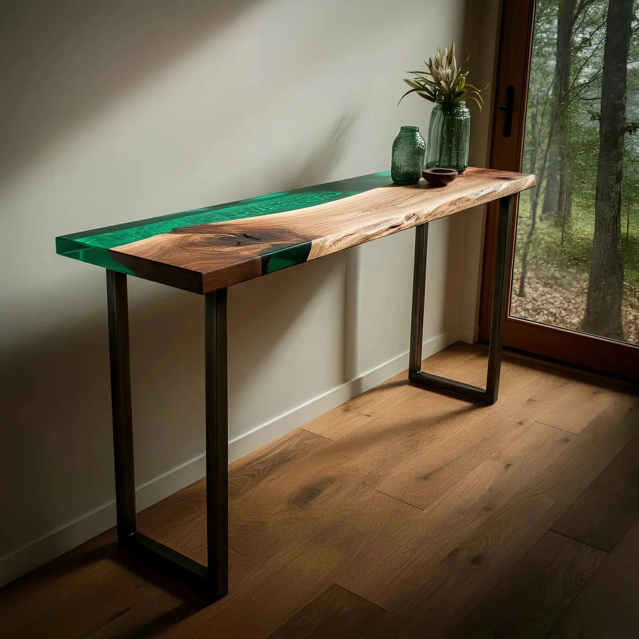 Sunlit Forest Console Table featuring walnut and green epoxy resin, placed in a forest-view entryway. Artisan-crafted for modern interiors.