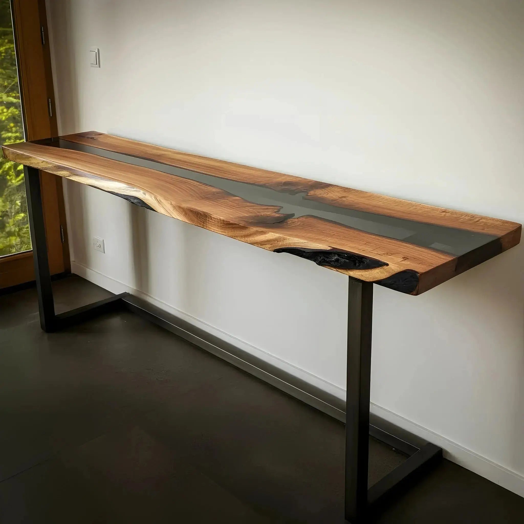 Elegant epoxy river console table crafted from walnut and black resin with minimalist metal legs, artisan made in the USA.