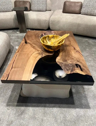 Handcrafted epoxy resin walnut coffee table with stone-inspired wooden legs