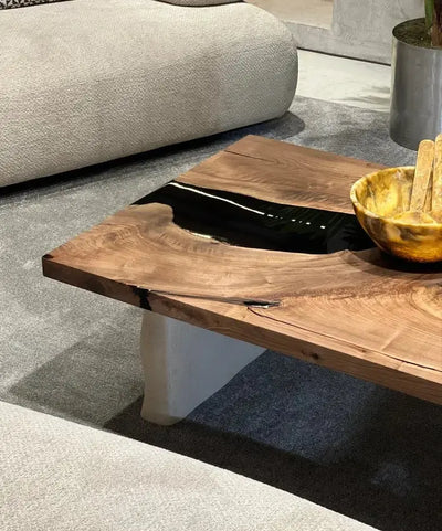 Handcrafted epoxy resin walnut coffee table with stone-inspired wooden legs