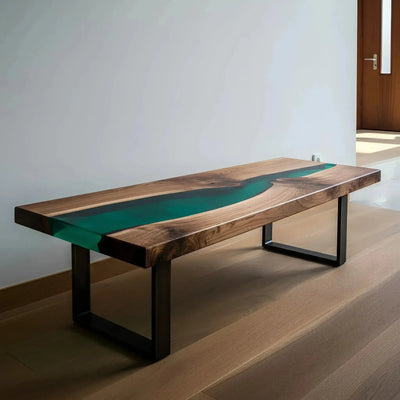 Handmade epoxy resin bench with live edge walnut wood and green resin, featuring metal legs, ideal for kitchen or dining seating.