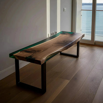 Handmade epoxy resin bench with live edge walnut wood and green resin, featuring metal legs, ideal for kitchen or dining seating.