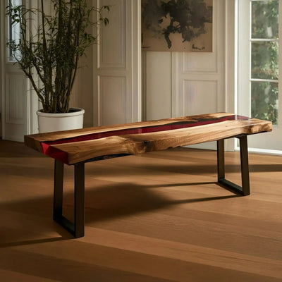 Custom epoxy bench featuring walnut wood and red resin with black metal legs. Handmade in the USA, ideal for dining or kitchen seating.