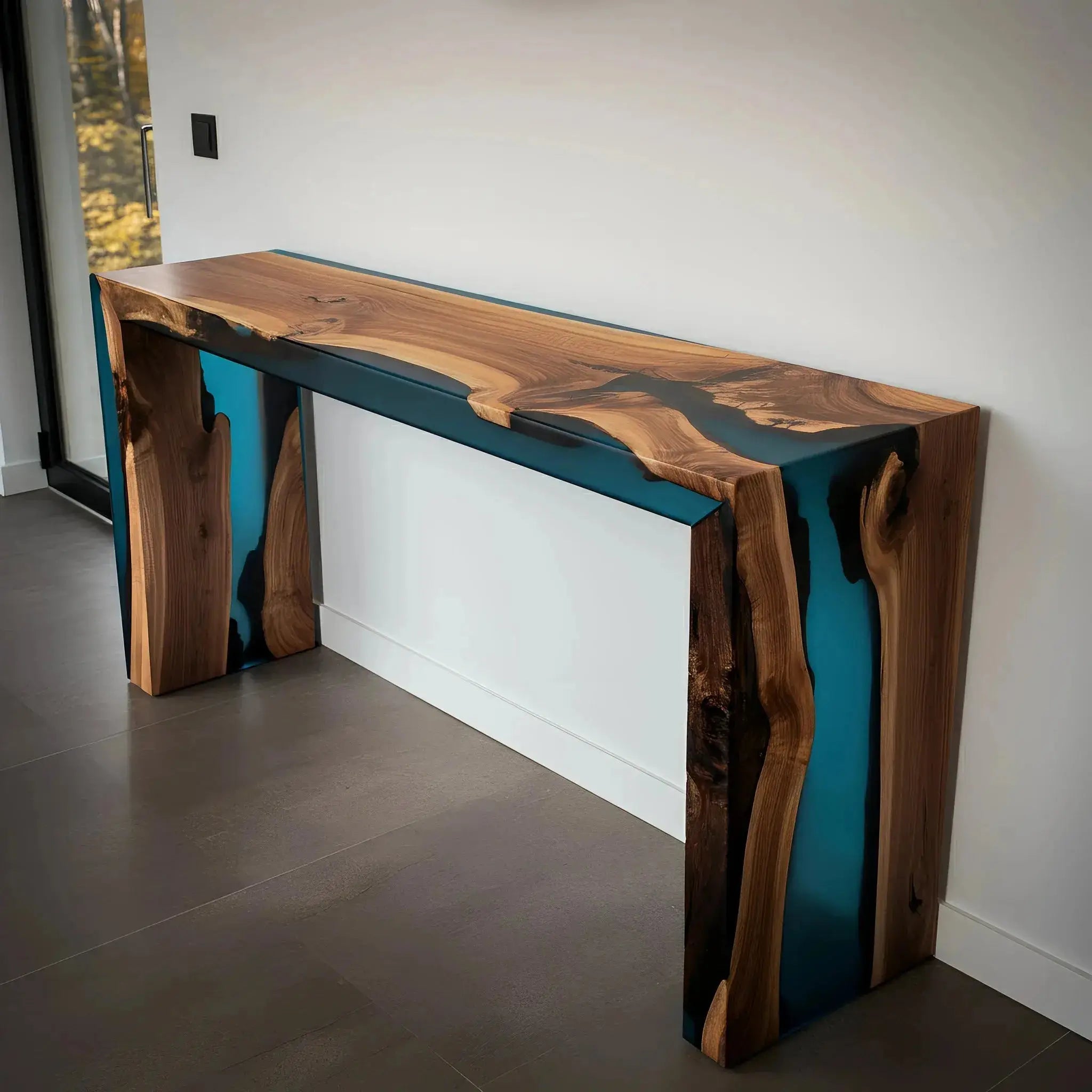 Bold epoxy river console table with full waterfall edge design in walnut and blue resin. A striking artisan-crafted furniture piece for modern homes.