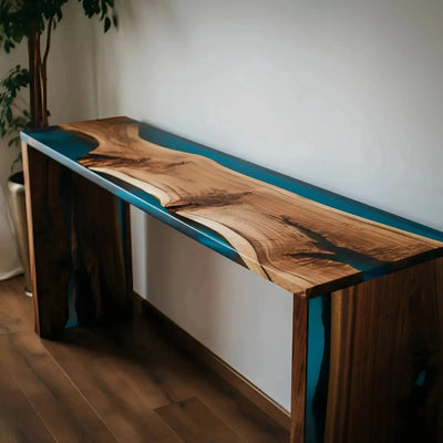 Handmade Blue Odyssey Console Table with walnut wood and blue epoxy resin, featuring black metal legs, perfect for entryways or living rooms.