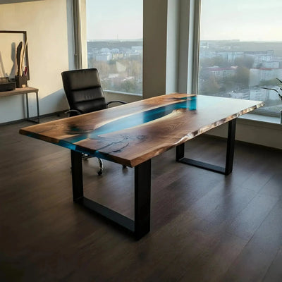 Handmade epoxy river office desk with walnut wood and blue resin, featuring metal legs and a sleek finish in a modern home office.