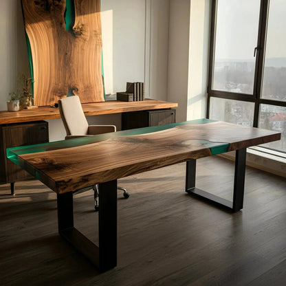 Epoxy river office desk featuring walnut wood and green resin in a bright office. Paired with matching wood decor and panoramic city view.