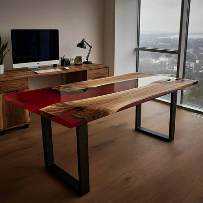 Handmade walnut and red resin epoxy river desk in a corner office. Premium office furniture supporting bird habitat preservation.