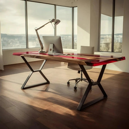 Modern epoxy river office desk with red resin and walnut wood, featuring angled metal legs. Handmade in the USA for stylish workspaces.